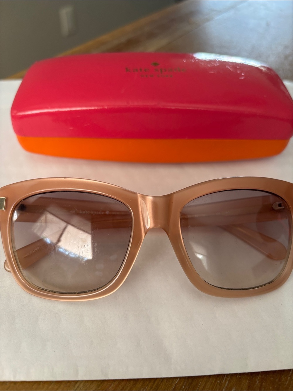 kate spade rose-tint framed sunglasses with hot pink and orange case